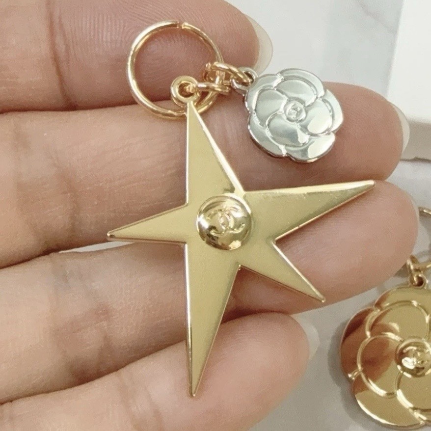 CHANEL Holiday Christmas Limited Edition Novelty Gold Star Charm With Box