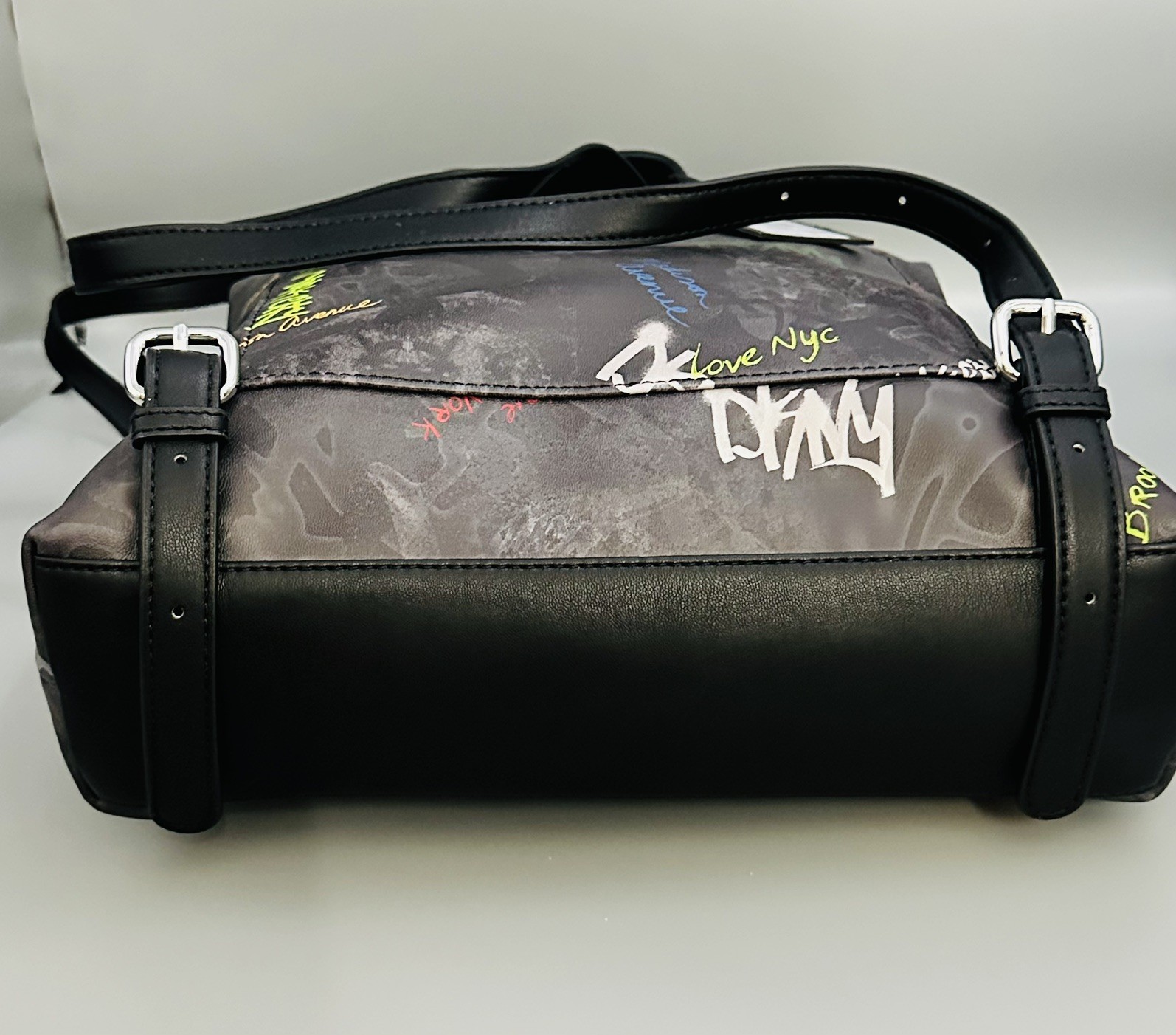 DKNY: Graffiti Tilly Flap Backpack, NWT W. Adjustable Straps