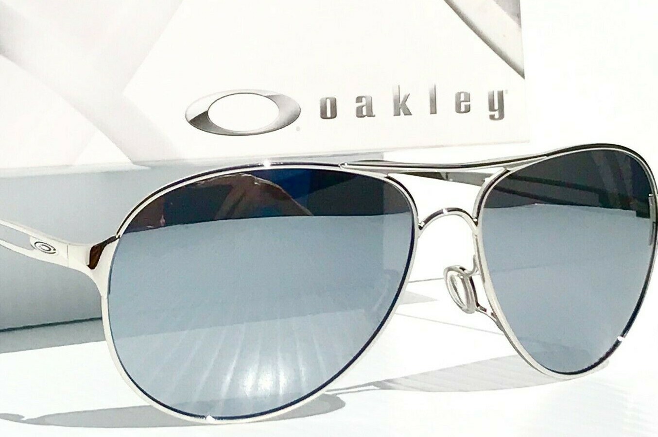 NEW* Oakley CAVEAT Silver POLARIZED Galaxy Chrome mirrored Sunglass 4054