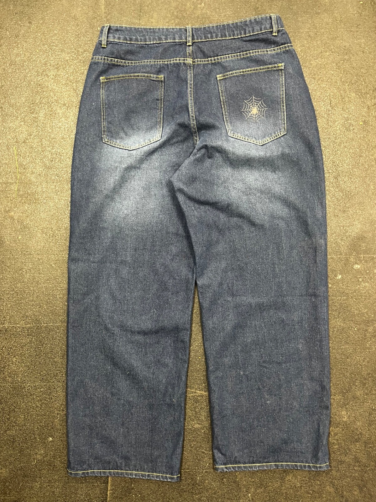 VYLLAN spyder jeans check description