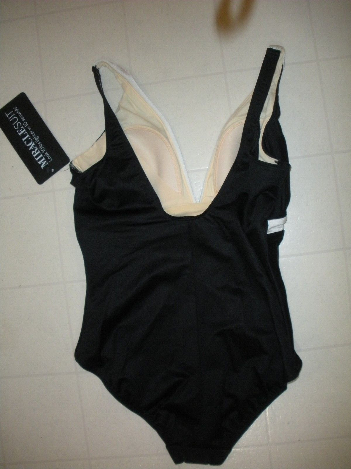 MIRACLESUIT Black Specrtra Trilogy 1 PC V Neck Style Swimsuit Sz 10 NWT