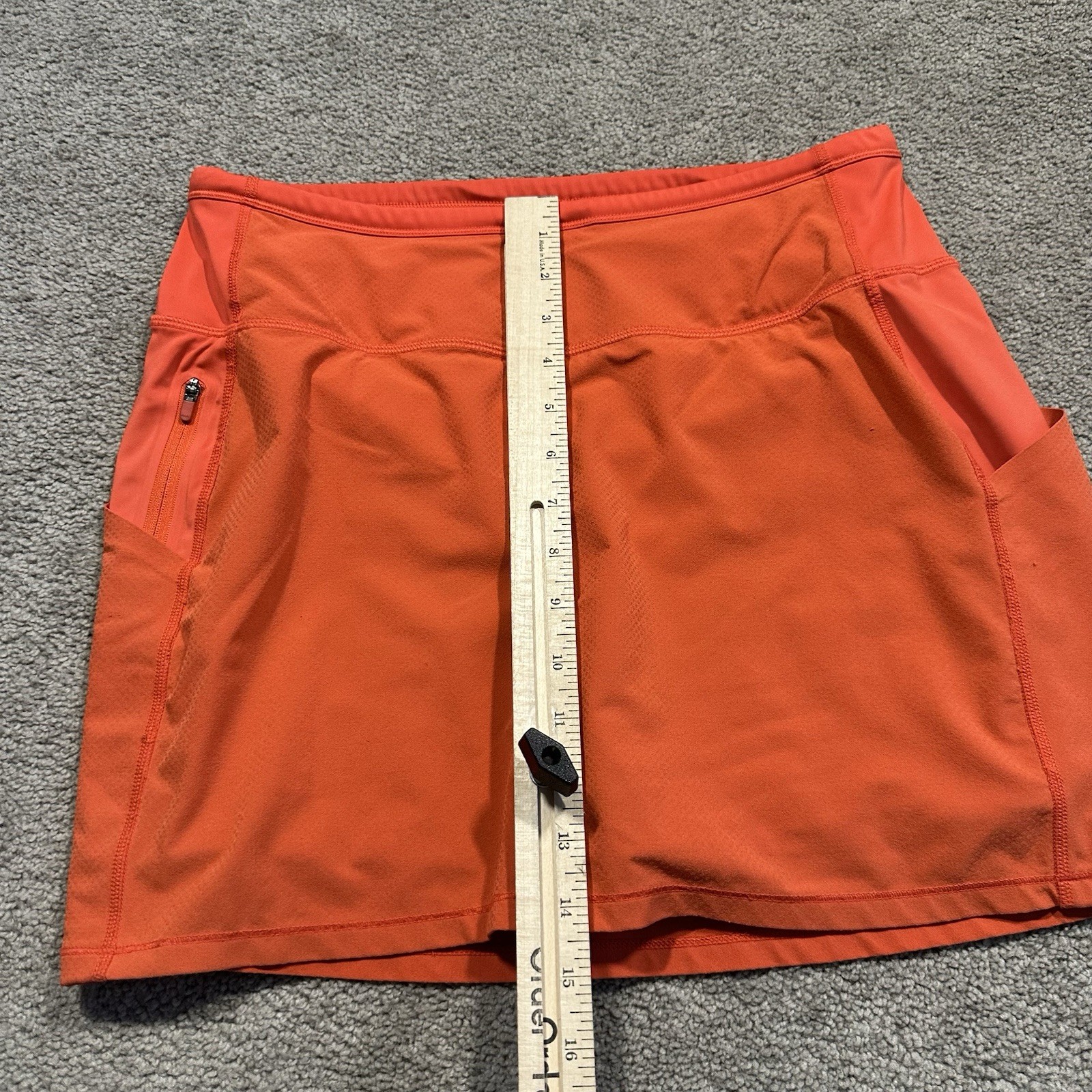 ATHLETA Action Skort in Dobby 14.5 Womens Small Orange Pockets Stretch Athletic