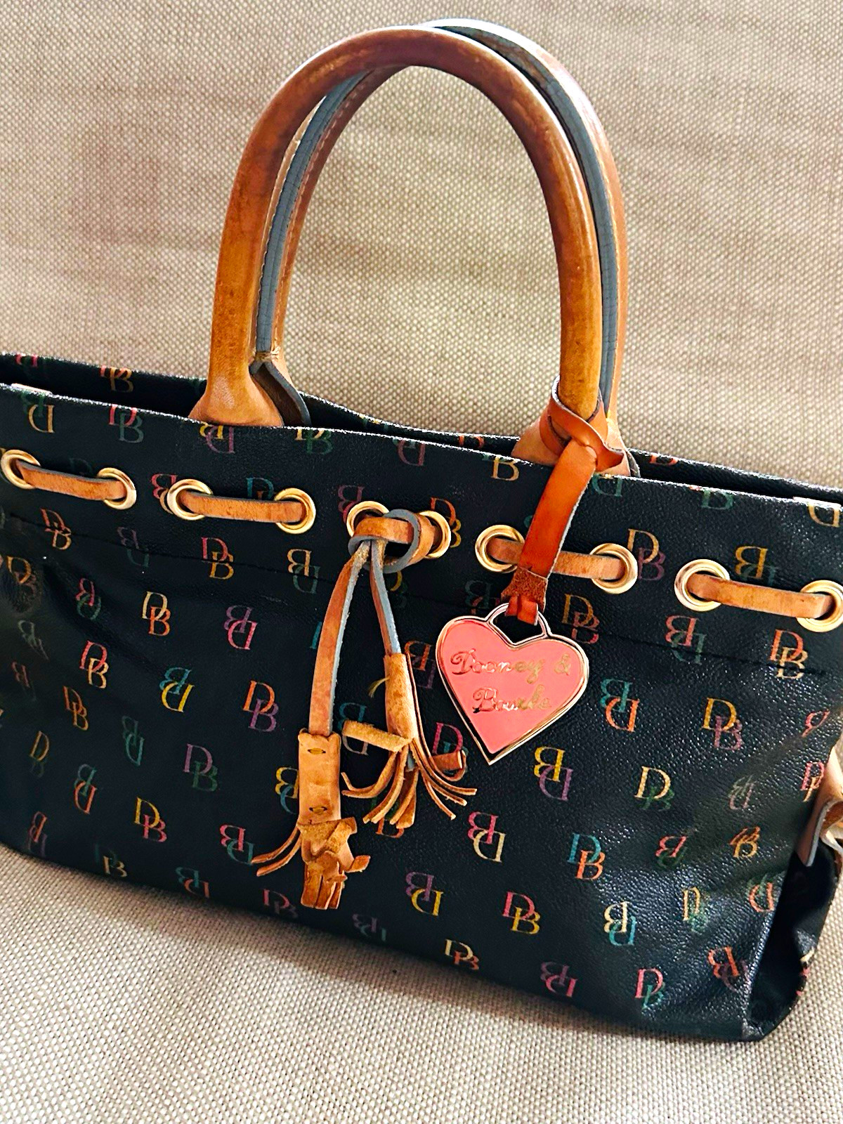 Dooney & Bourke Black/Multicolor Logo Medium Tote Double Handle Tassel Charm