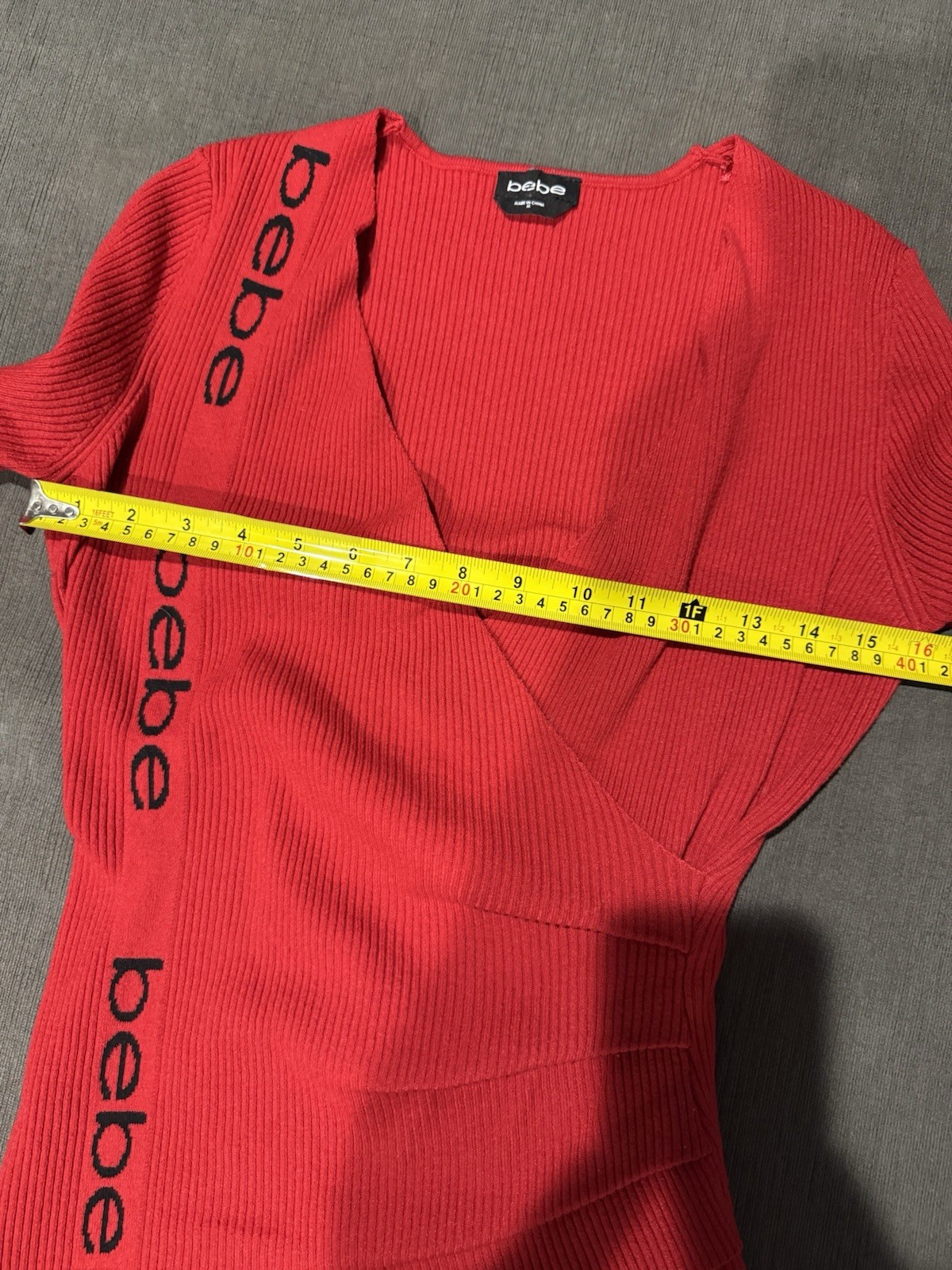 BEBE Red Asymmetric Side LOGO Faux Wrap Ribbed Knit V Neck Sweater Size Small