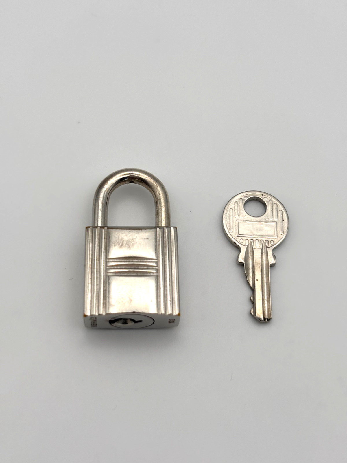 HERMES Set of Padlock & Key Cadena Silver Charm Number random Authentic Used