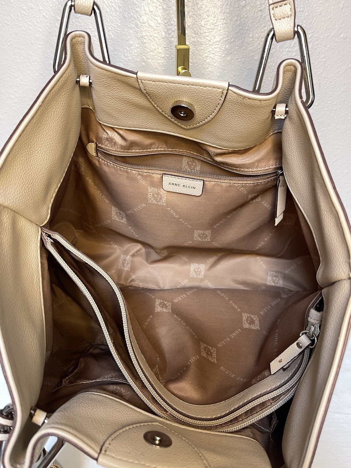Anne Klein Taupe Vegan Pebbled Texture Tote with Lion and Tassel Charms