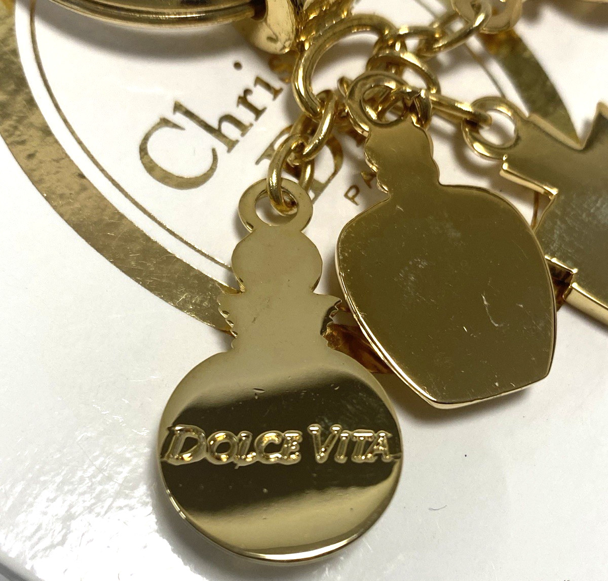 Dior novelty key chain bag charm key holder gold color brand near mint condition