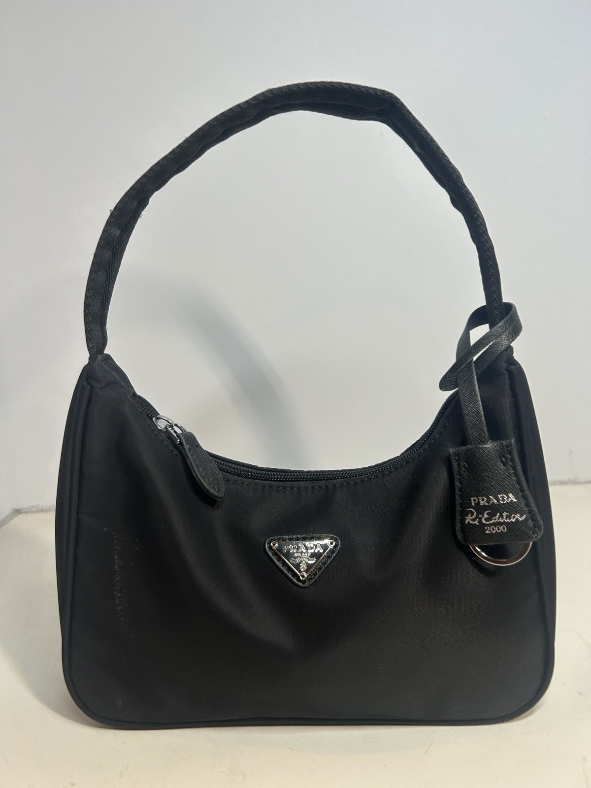 PRADA Re-Edition 2000 Black Mini Shoulder Bag Silver Hardware Zip Logo Charm