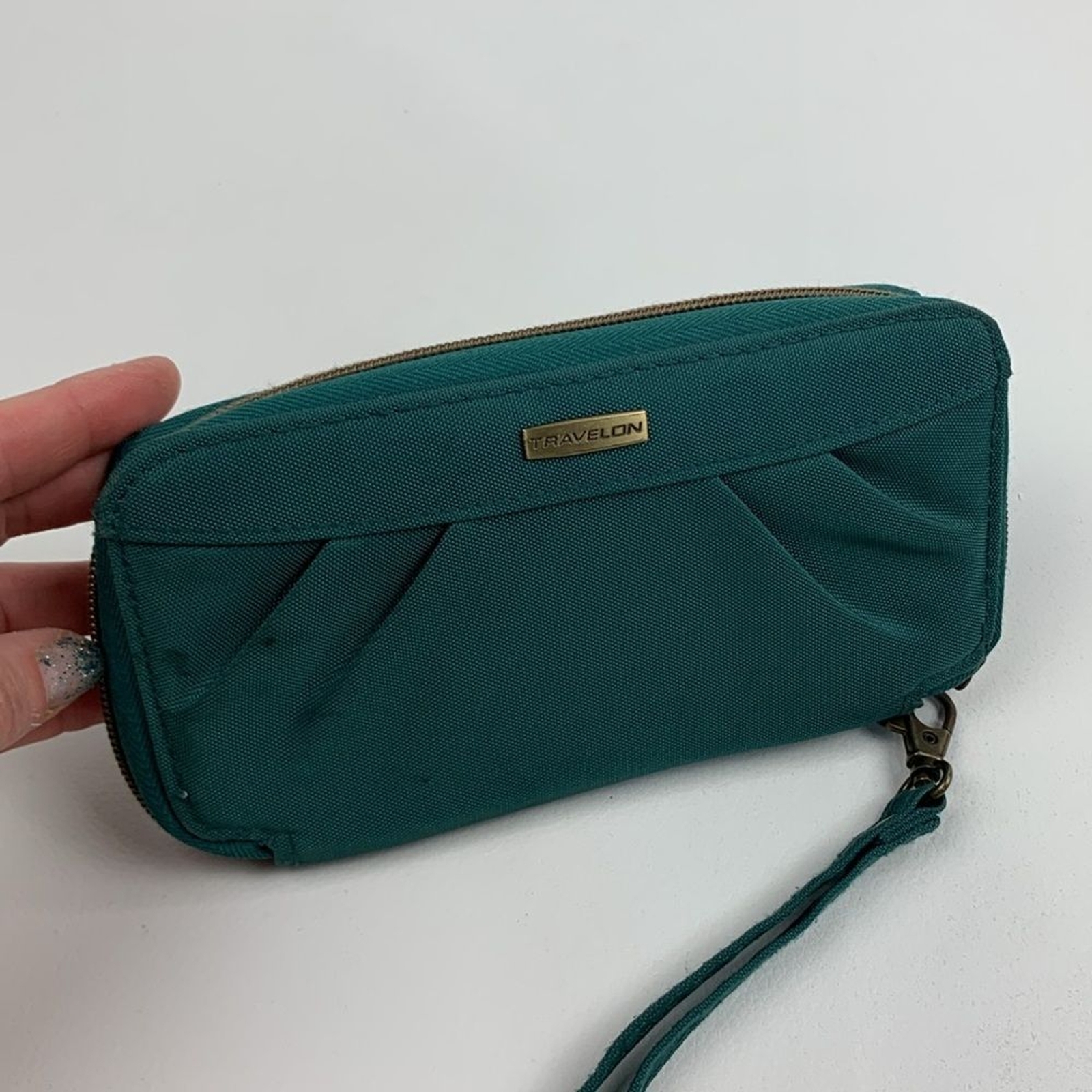 Travelon Dark Teal Green Clutch Wristlet wallet & brass Accents Zip around strap