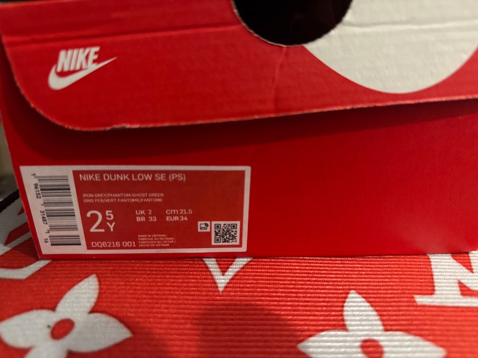 Nike Dunk Low SE “Halloween” sneakers in a grey and black colorway, featuring a