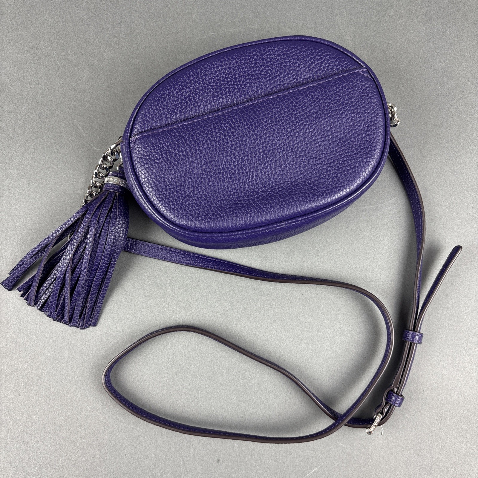 Michael Kors Purple Pebbled Leather Small Oval 7.75″x5.5″ Crossbody Bag w/Tassel