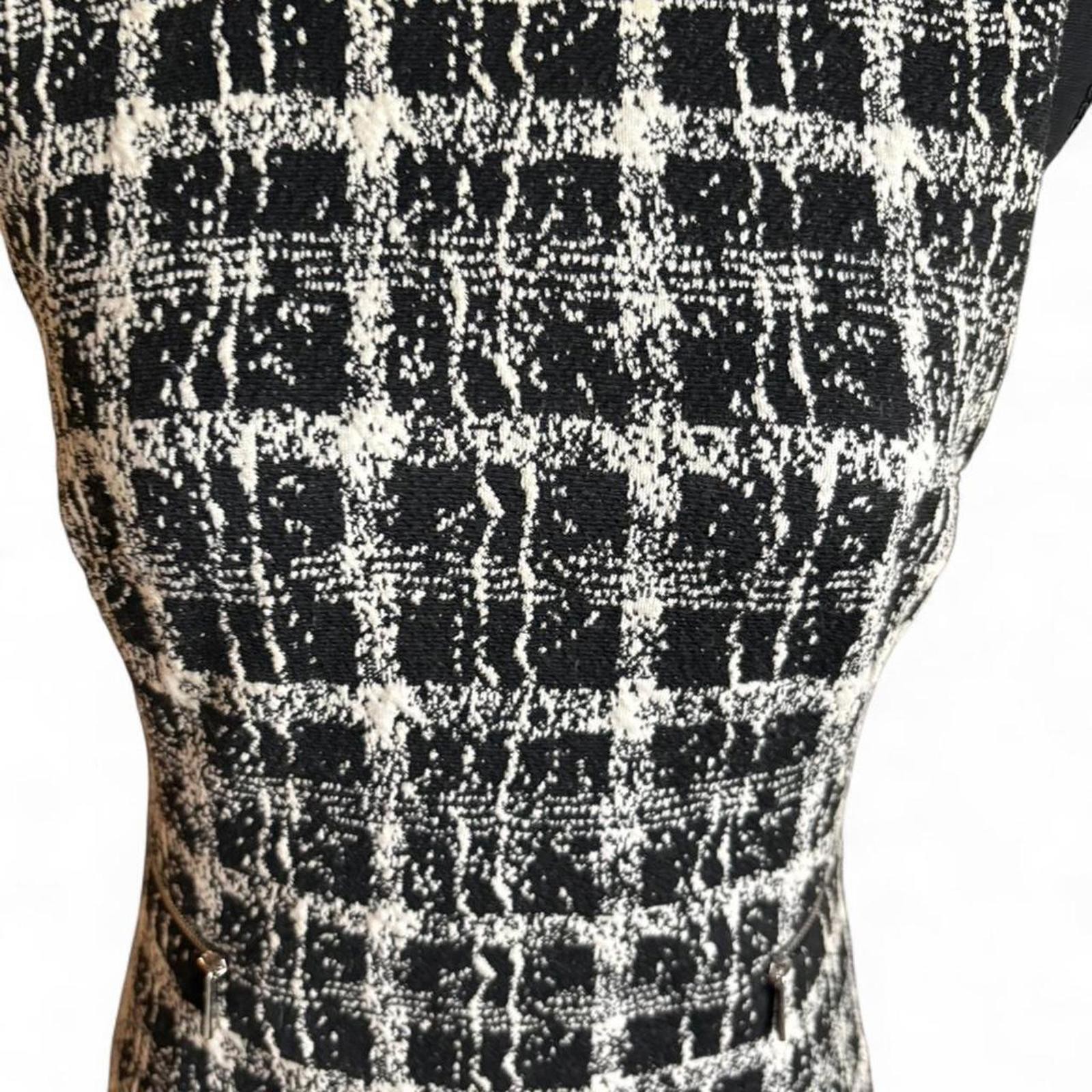 Calvin Klein form fitting dress, stretchy fabric lined size small
