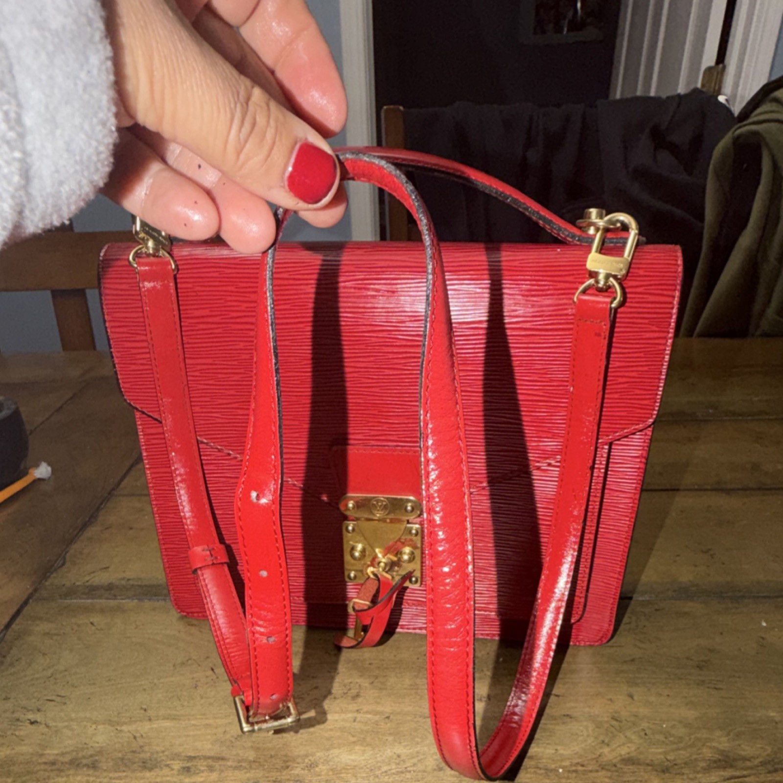 Louis Vuitton Red Epi Monceau 28 Handbag in textured leather/gold-tone hardware