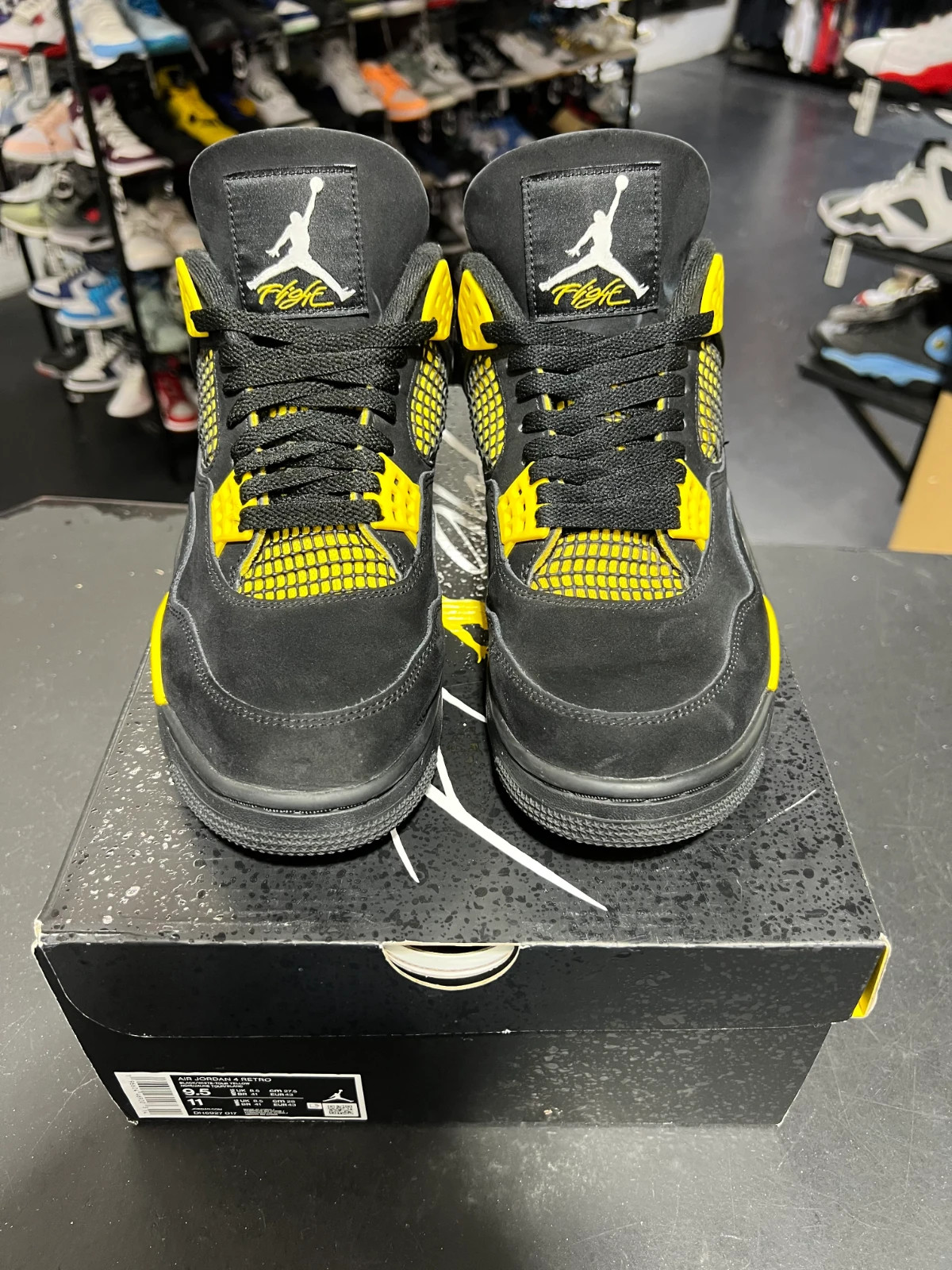 Size 9.5 – Jordan 4 Retro Mid Thunder PRE-OWNED