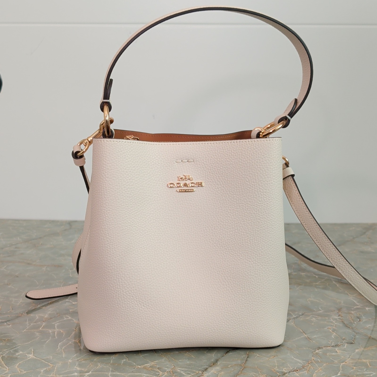 Coach White Crossbody Bucket Bag Gold Hardware Adjustable Strap Bag Charm