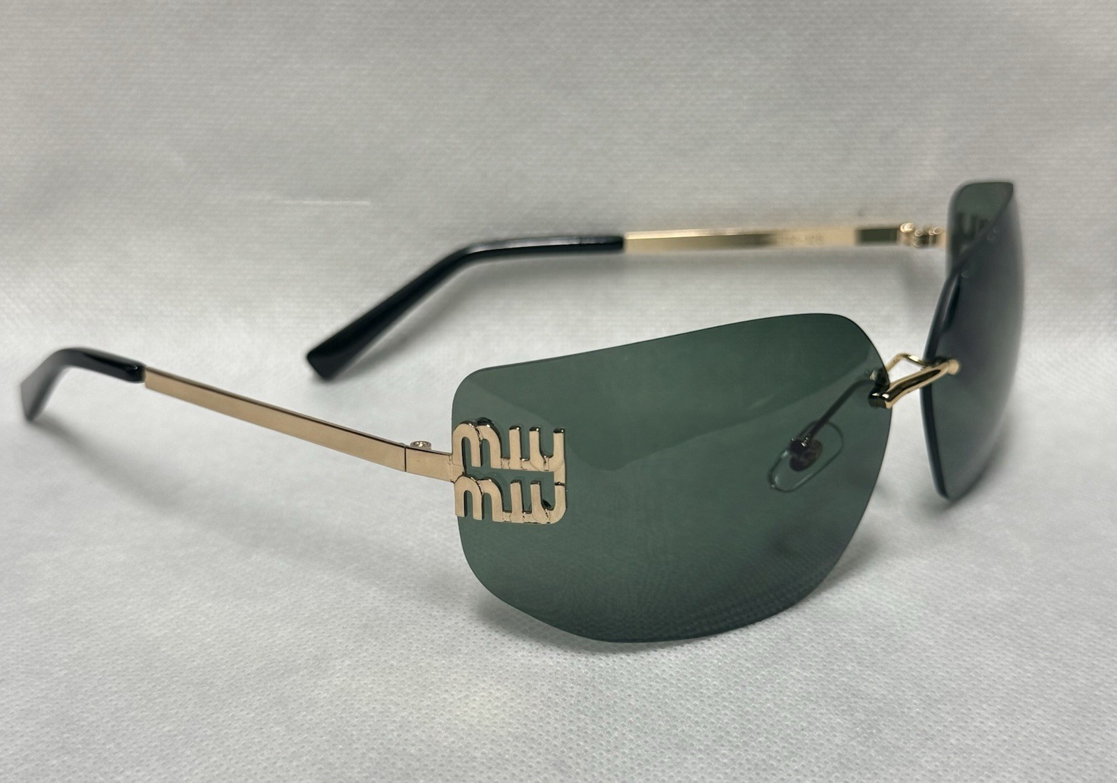 Miu Miu Women’s Rimless Shield Sunglasses Gold Metal Frame Green Gradient