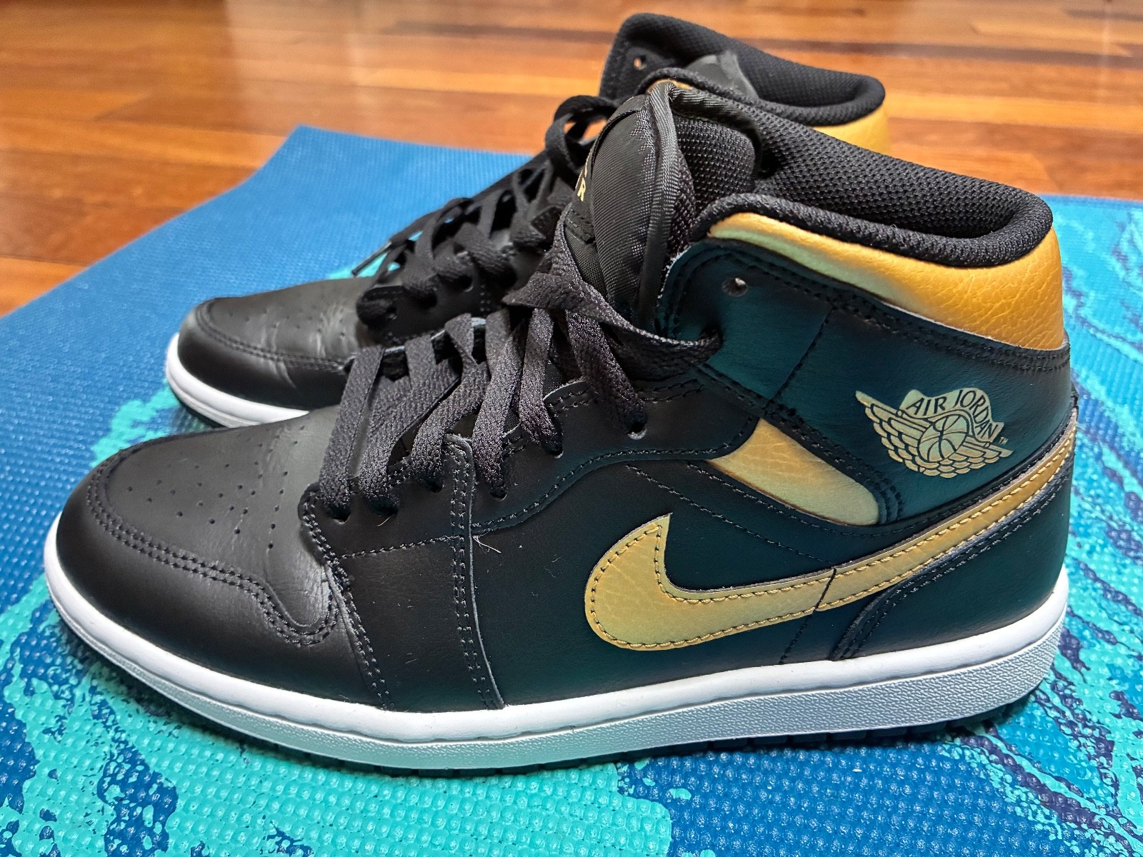 Men’s Nike Air Jordans size 8.5. Black&Gold. Clean and only worn a few times.