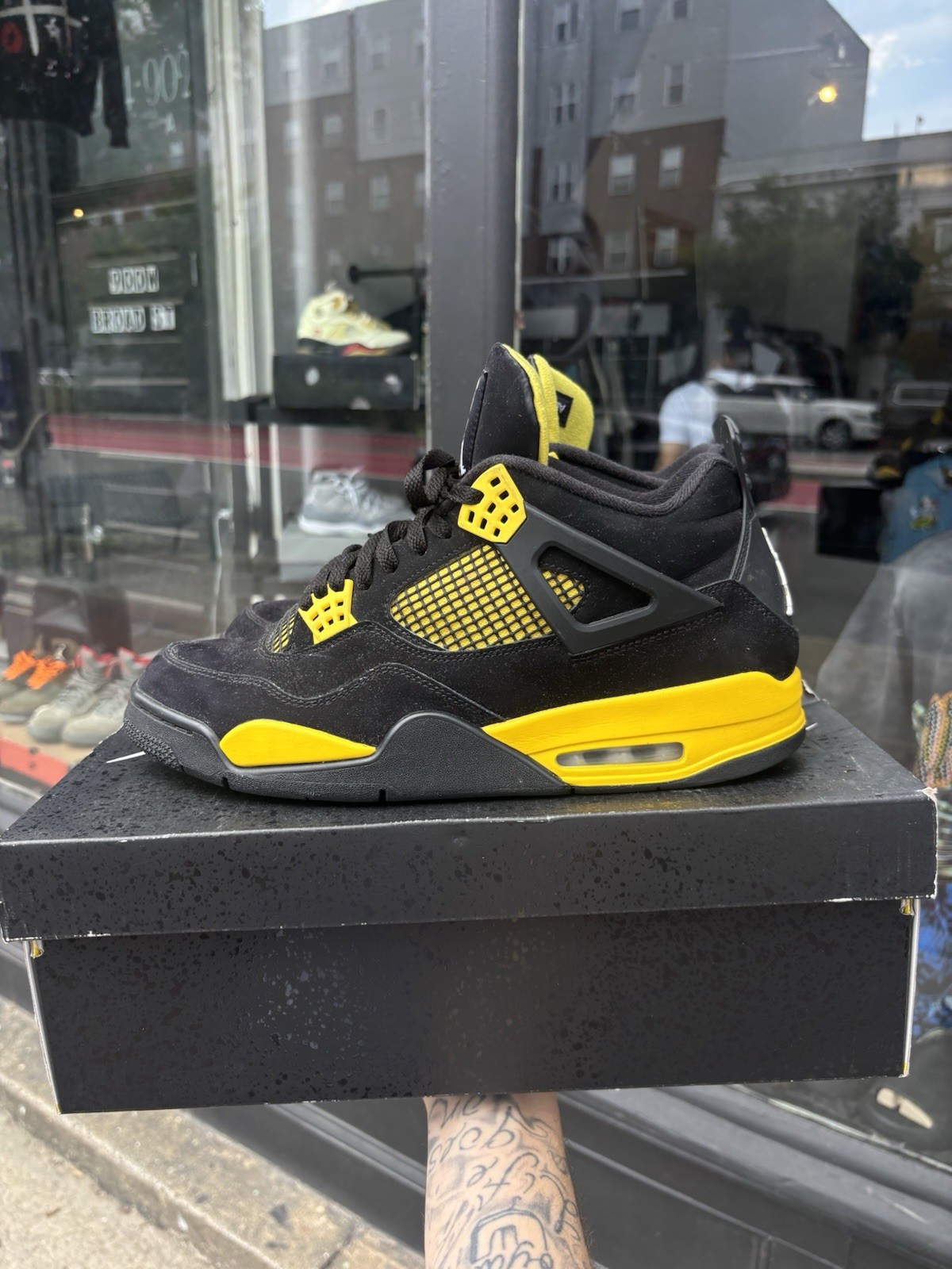 Jordan Air Jordan 4 Retro Thunder Black/Tour Yellow 2023 DH6927-017