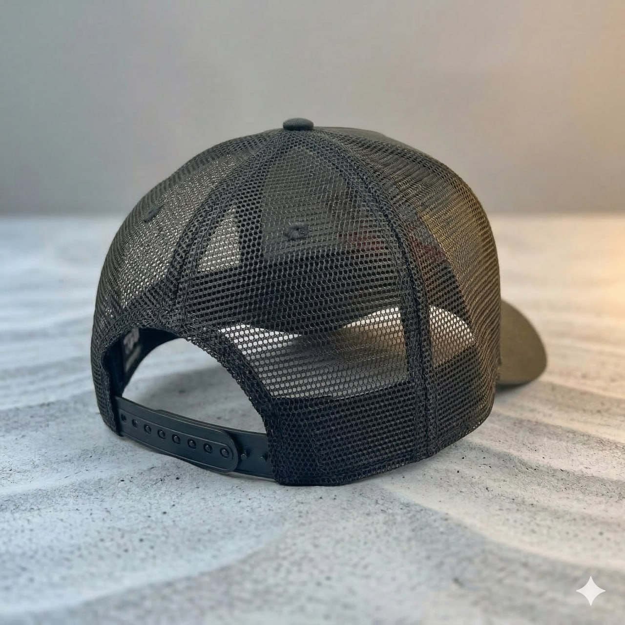 Adjustable Gray Mesh Trucker Cap Featuring Embroidered Monster Logo