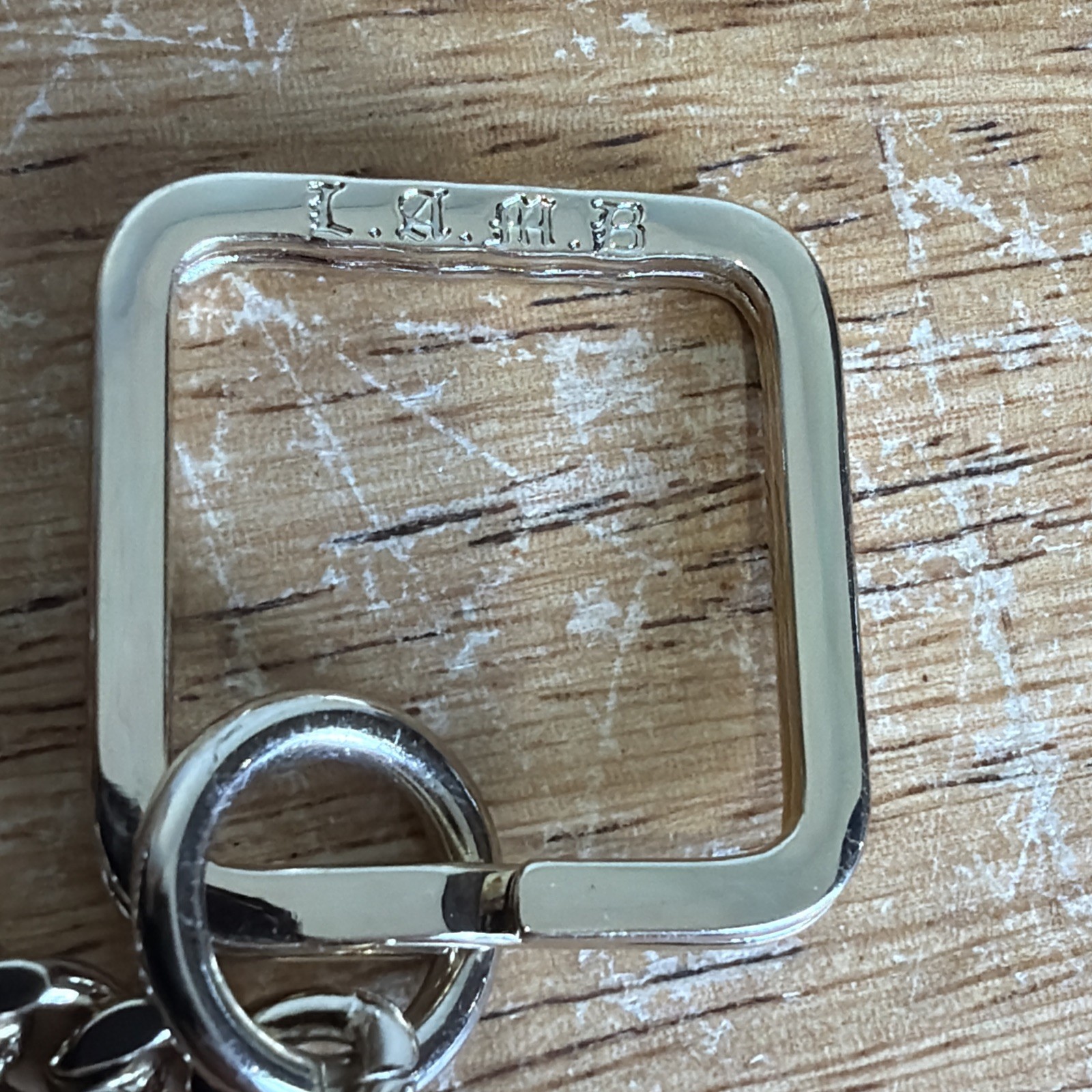 L.A.M.B Gwen Stefani Alchemy Key Chain Wallet Black And White Very Nice