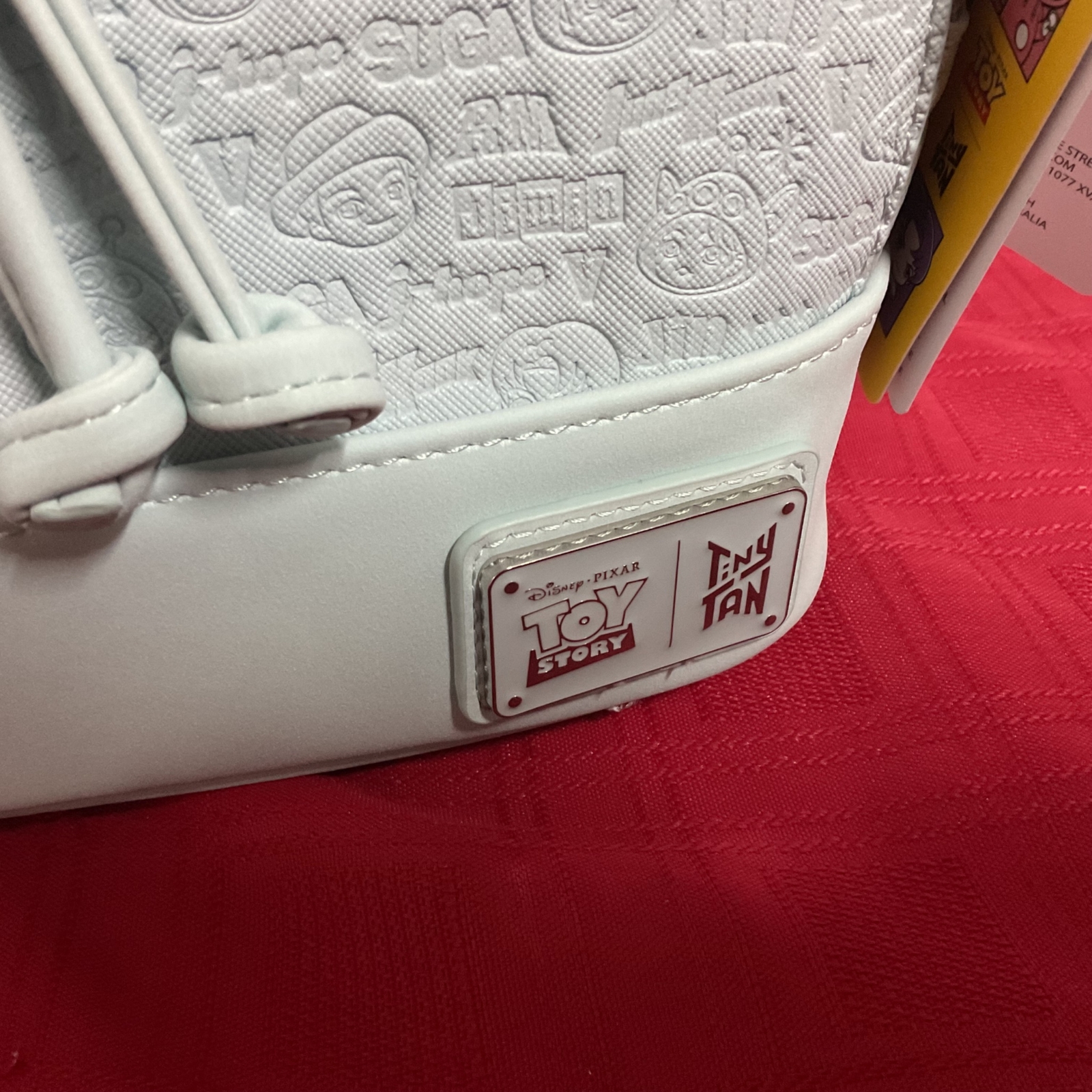 LOUNGEFLY DISNEY PIXAR TOY STORY TINYTAN EMBOSSED CHARACTERS BACKPACK NWT!!