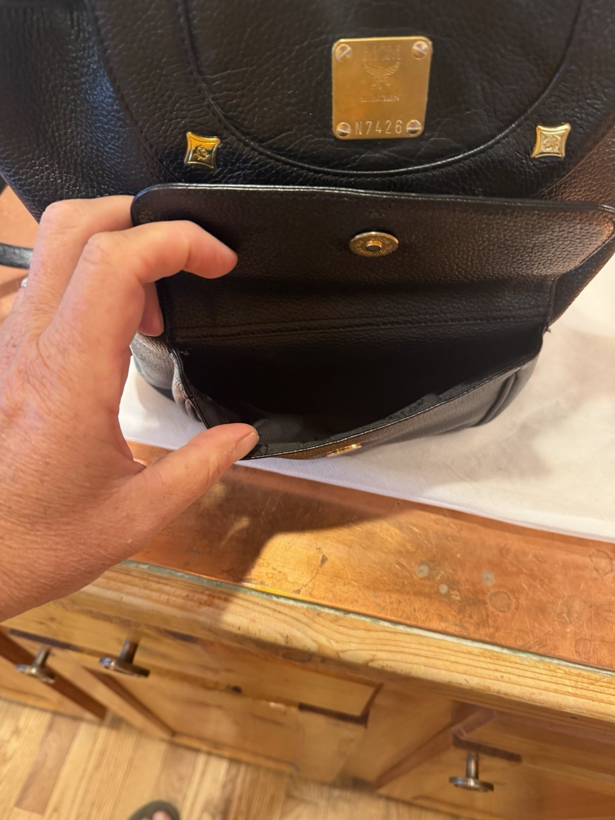 MCM Black Drawstring Backpack, Magnetic Closure, Gold Hardware, Dust Bag