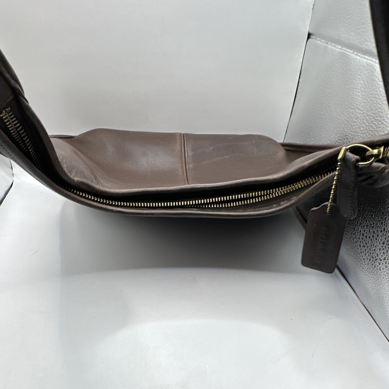 vintage Coach Ergo Zip Hobo Shoulder Bag crafted from mahogany brown leather.