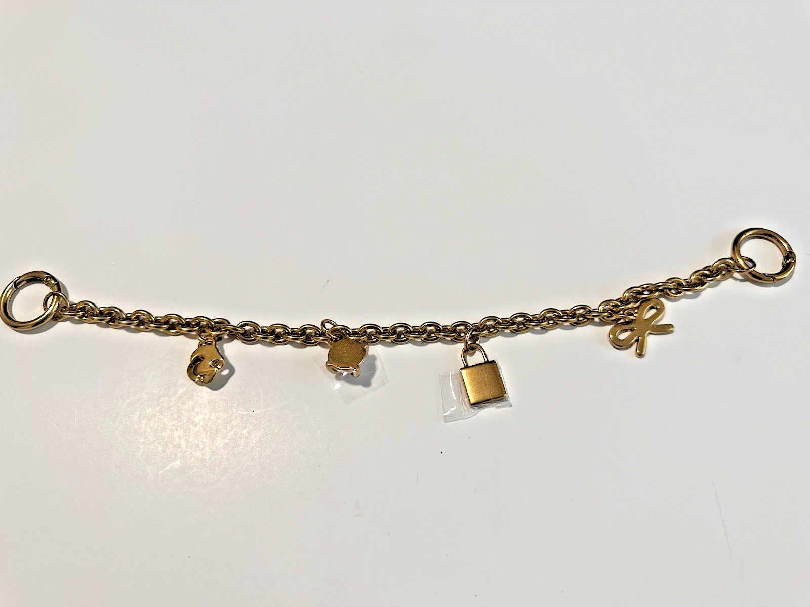 @@ NEW Ted Baker London Logo Gold Brass HandBag Purse Charm Chain Pearl Lock Bow