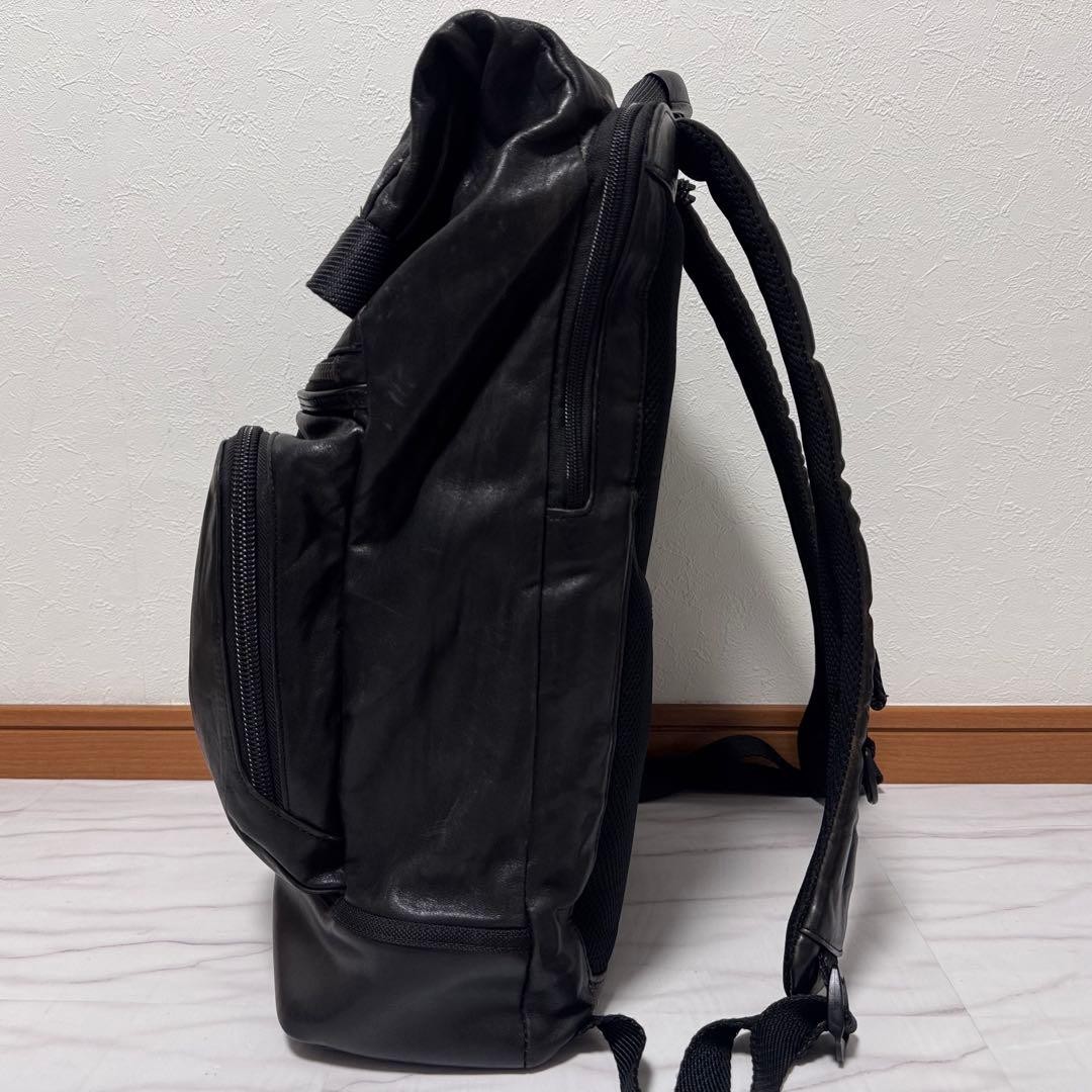 TUMI Bravo London Roll Top All Leather Backpack Black