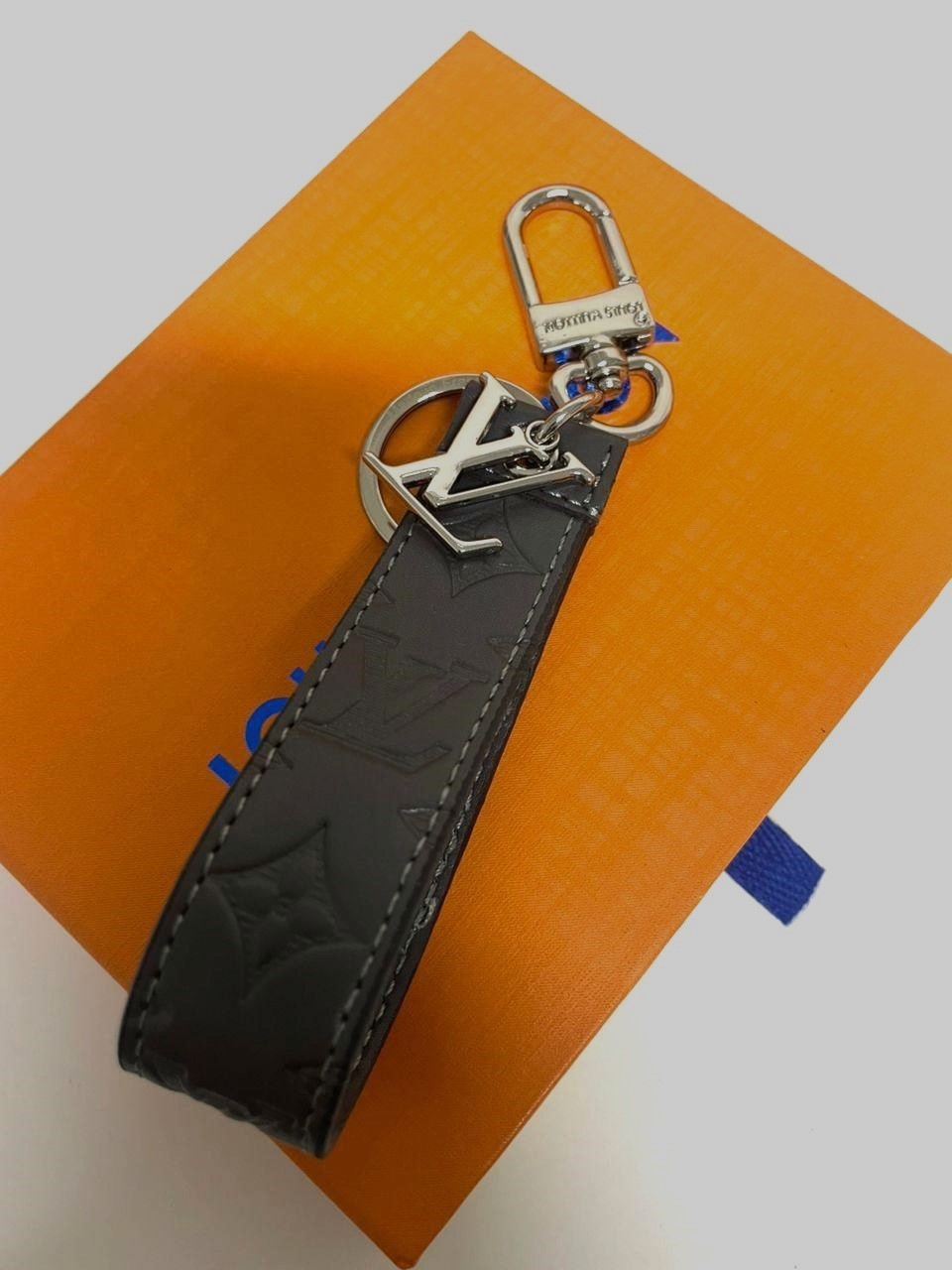 LOUIS VUITTON LV Shadow Dragonne Key Holder And Bag Charm
