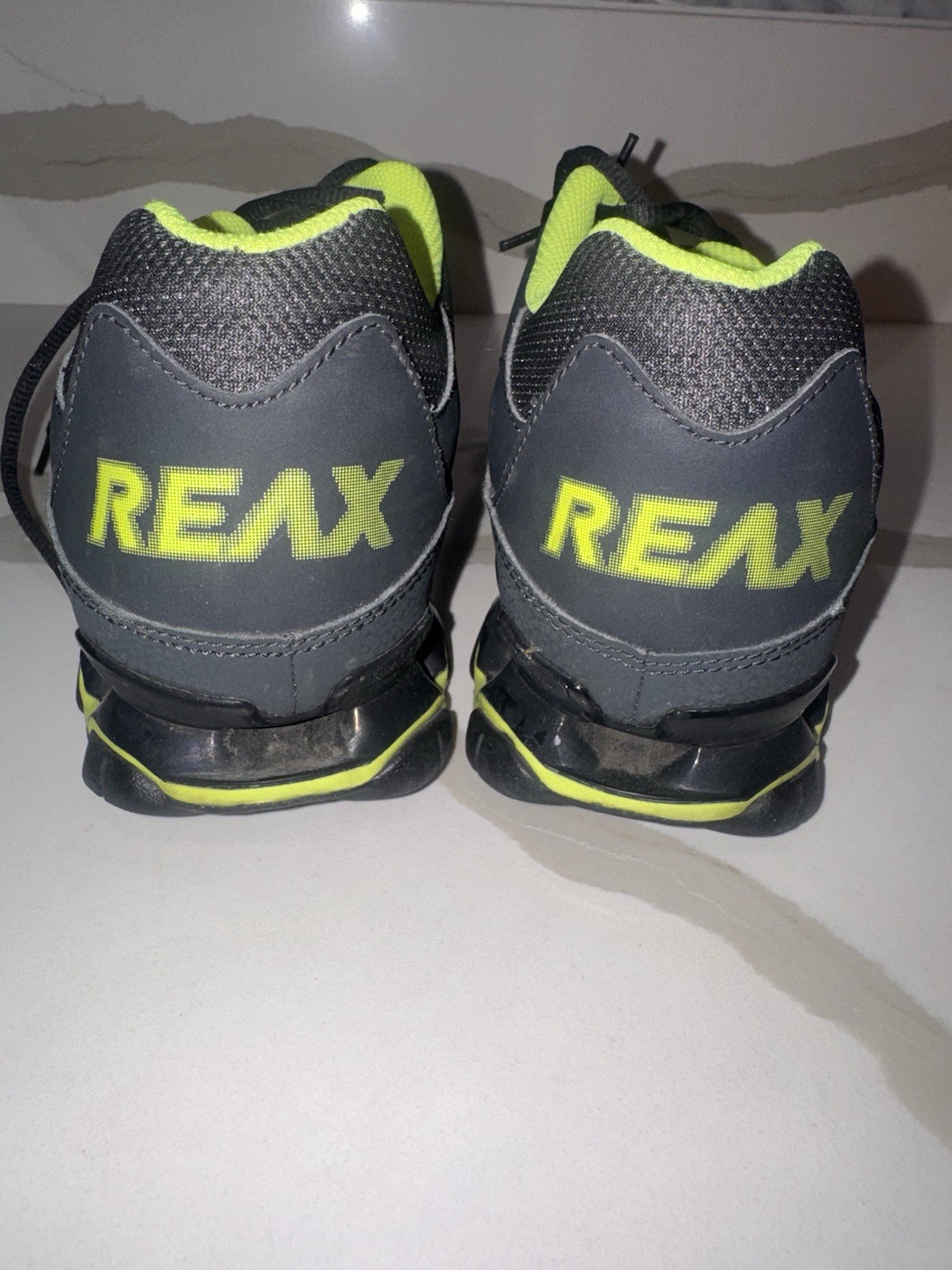 Nike Reax training shoes in an anthracite and volt green colorway Size 12