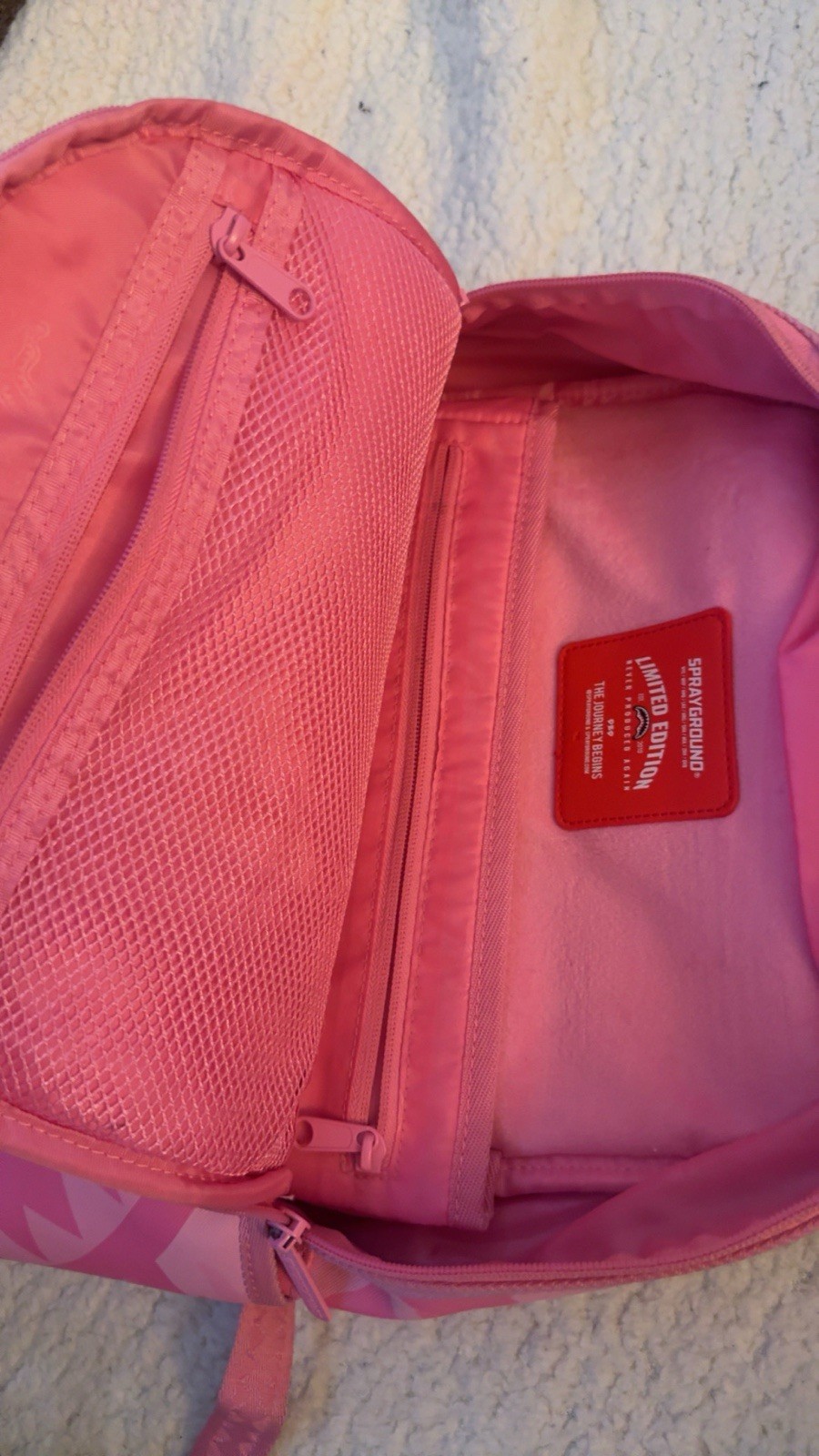 Pink Spray Ground Backpack