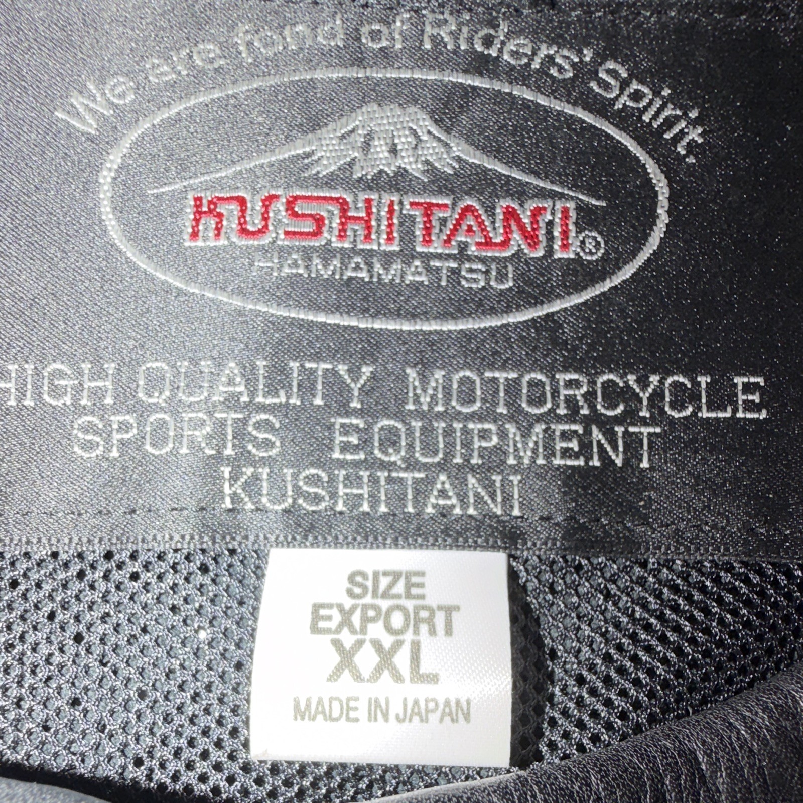 Kushitani leather biker jacket features a perforated design for airflow.