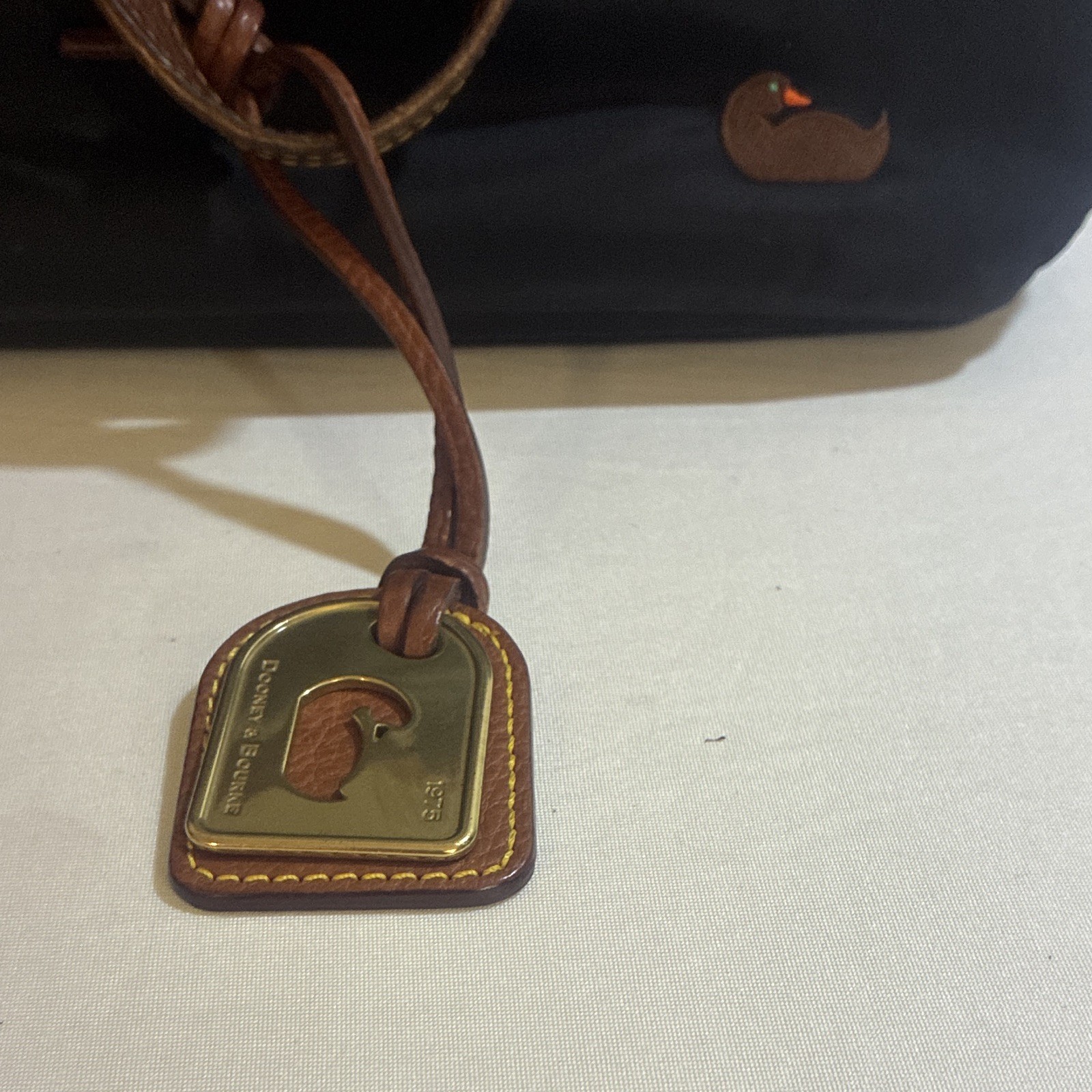 Dooney & Bourke Black Tote Bag, Zip & Magnetic Closure, Gold Hardware, Charm