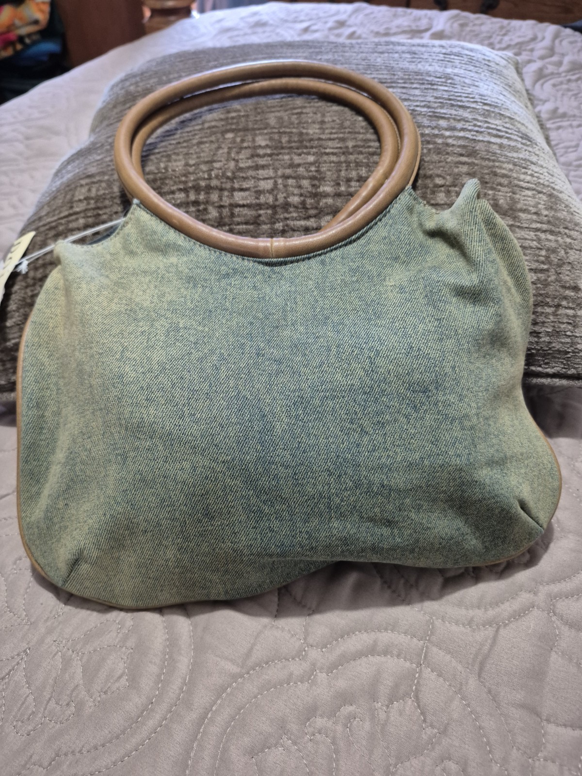 Dolce Vita light blue denim handbag with brown leather accents and floral embroi