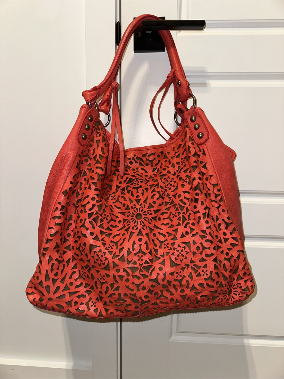 Isabela Fiore Coral leather laser cut Tote Handbag EUC Medallion front slouchy