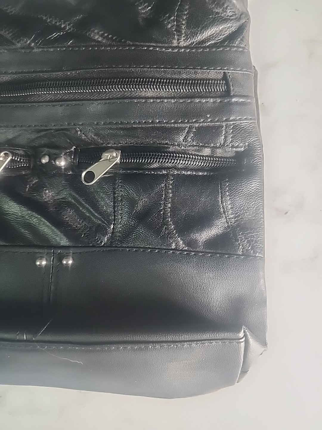 Black solid Stone NY Leather Purse w/ man made trim and over shoulder strap