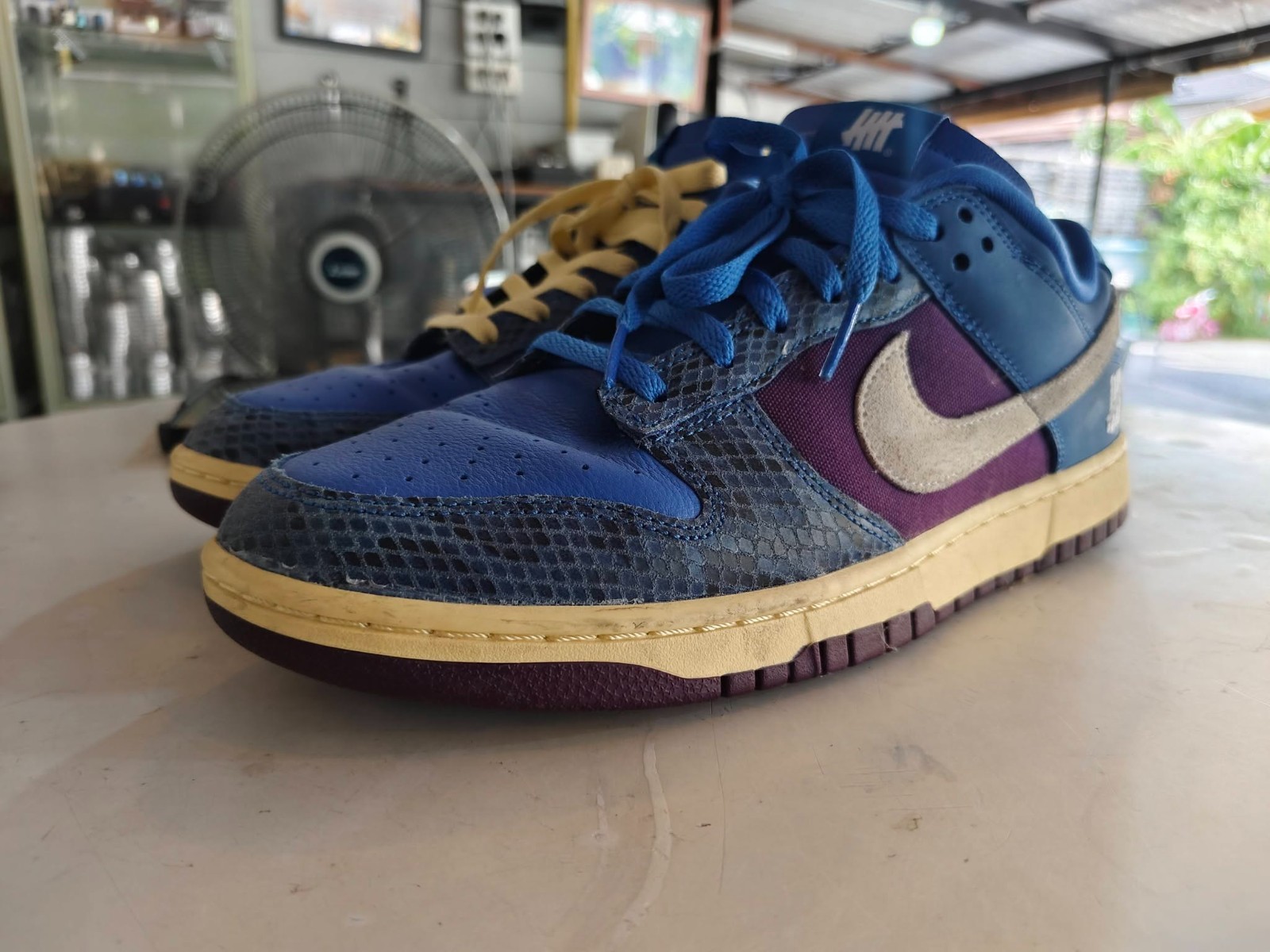 UNDEFEATED’s “Dunk vs. AF-1” Collection Grows With This Snakeskin- Dunk Low