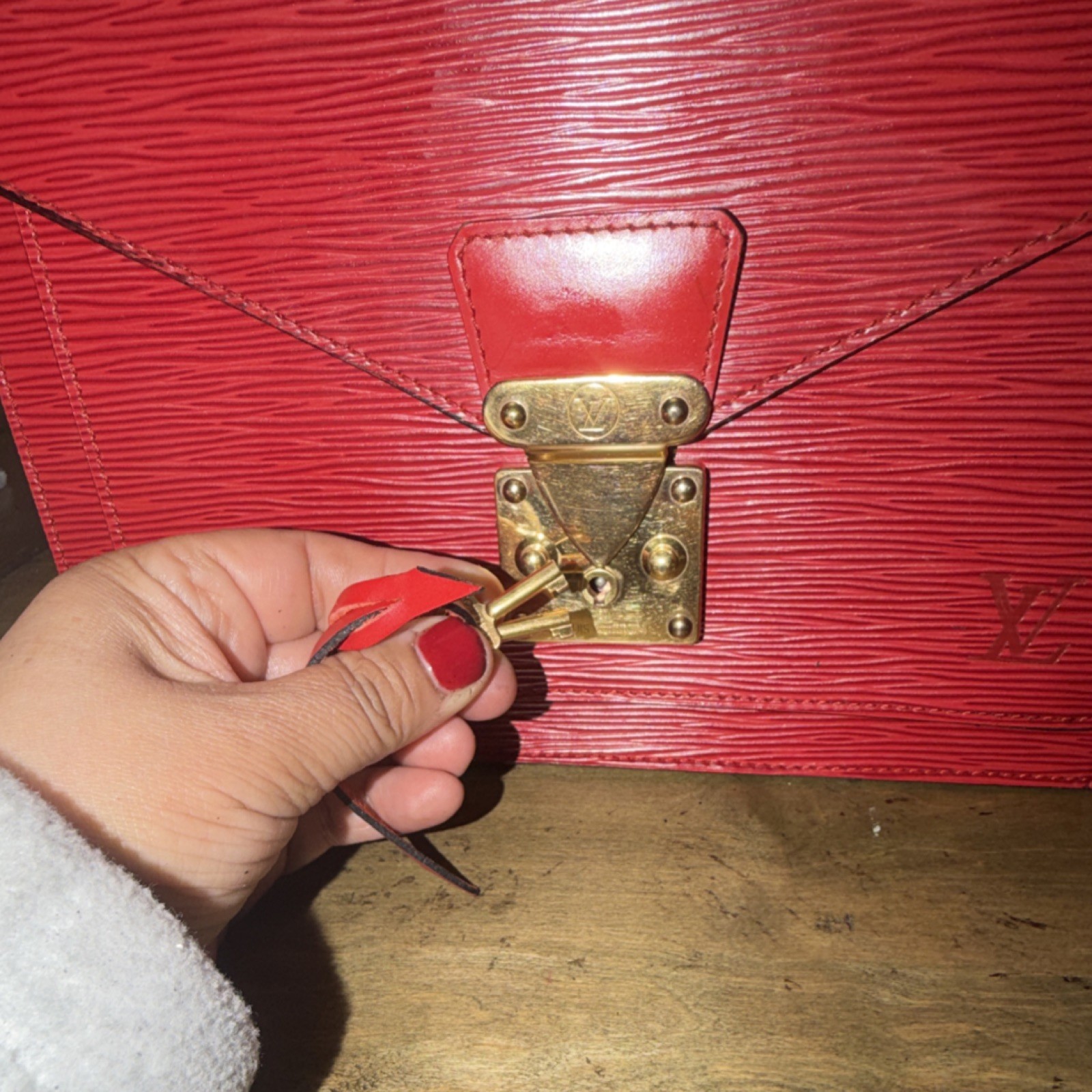 Louis Vuitton Red Epi Monceau 28 Handbag in textured leather/gold-tone hardware