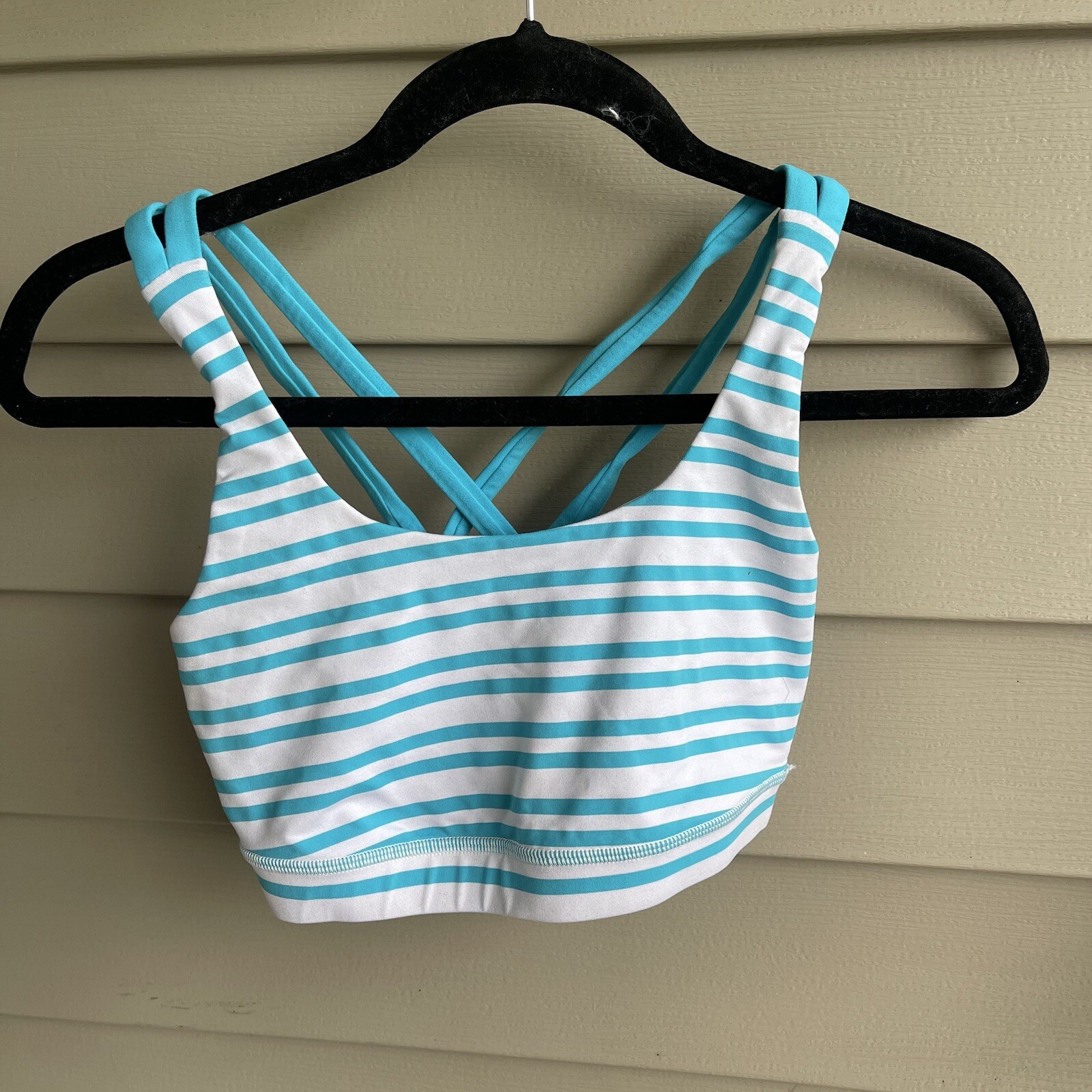 Women’s Lululemon turquoise and white crop athletic top. size M Prev. owned