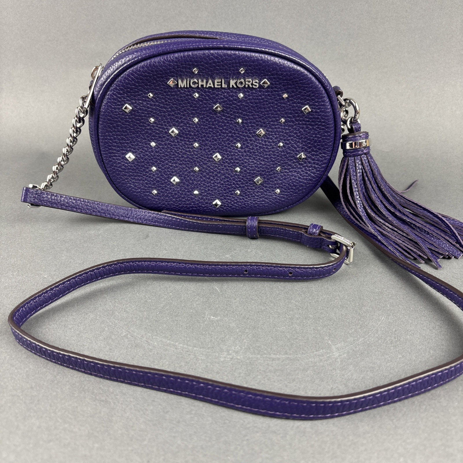 Michael Kors Purple Pebbled Leather Small Oval 7.75″x5.5″ Crossbody Bag w/Tassel
