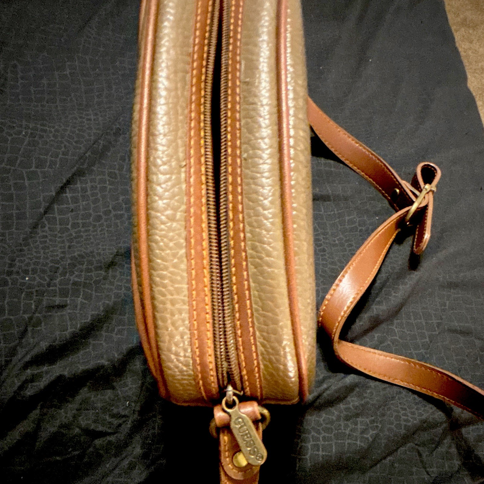 GUESS Pebbled Tan Brown Oval Crossbody Bag Zip Top Adjustable Strap Pockets