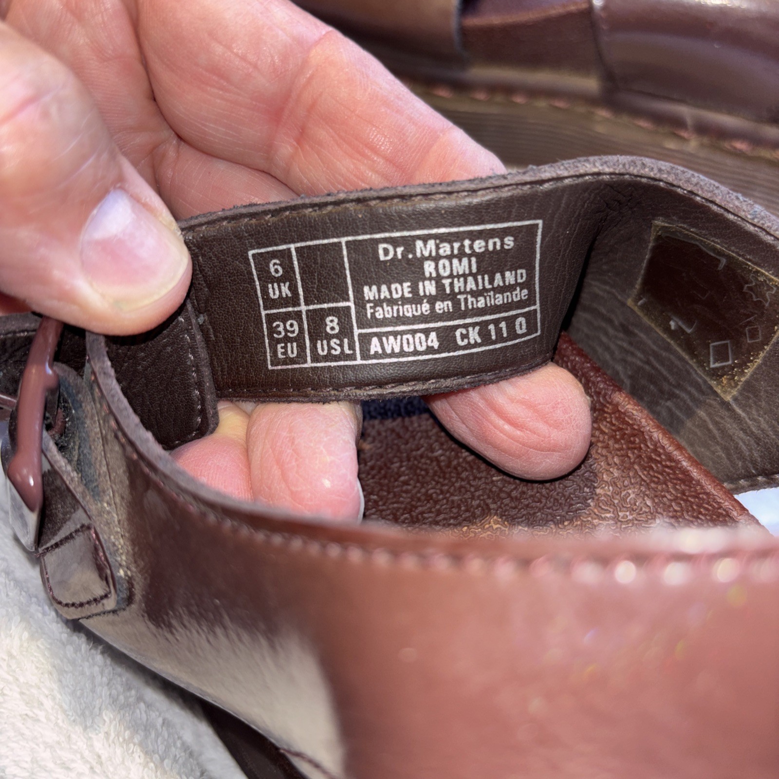 Dr. Martens Romi Y-Strap Sandals in an oxblood/brown patent leather finish