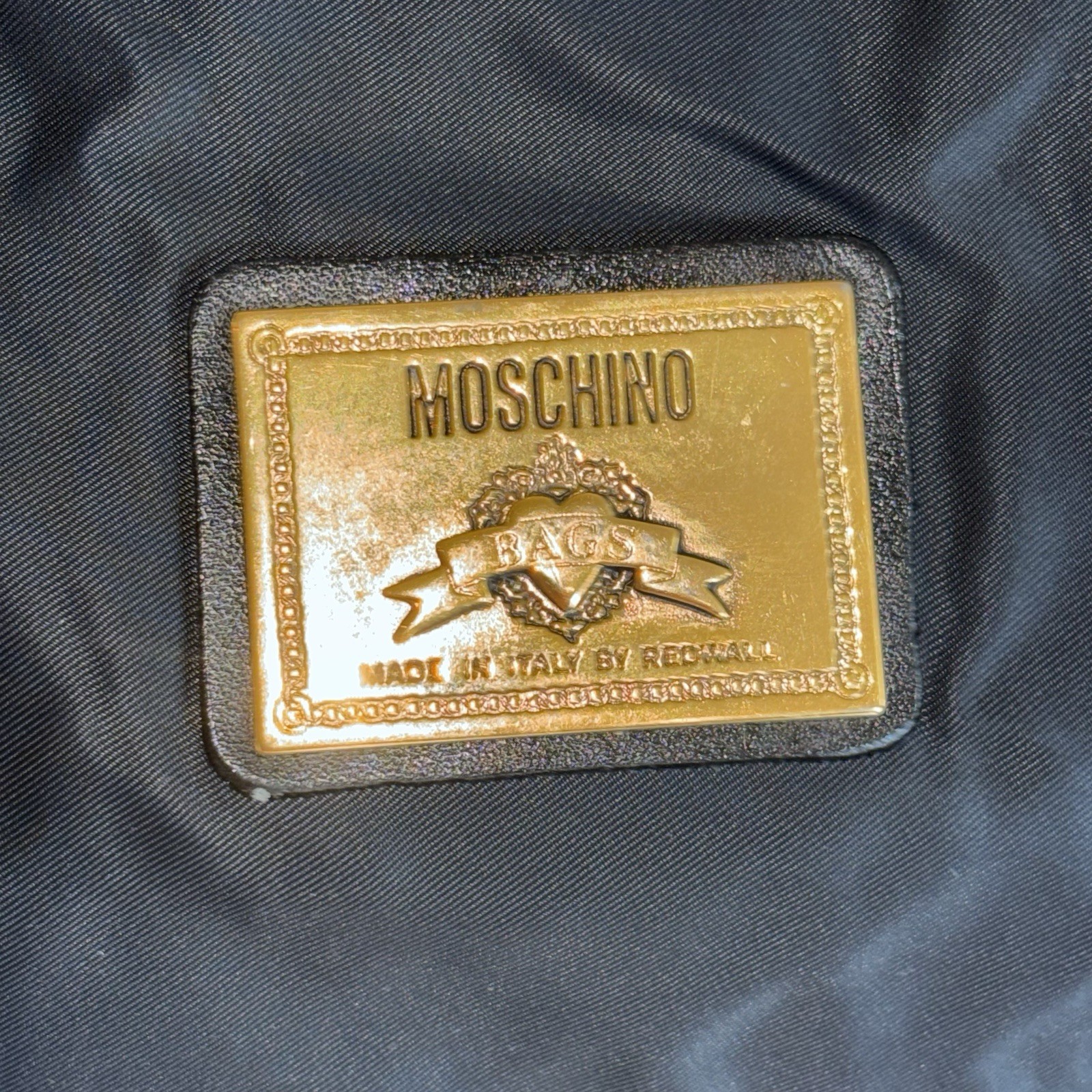 Moschino Redwall Italy Black Nylon Leather Block Leather Duffle Tote Bag “READ”
