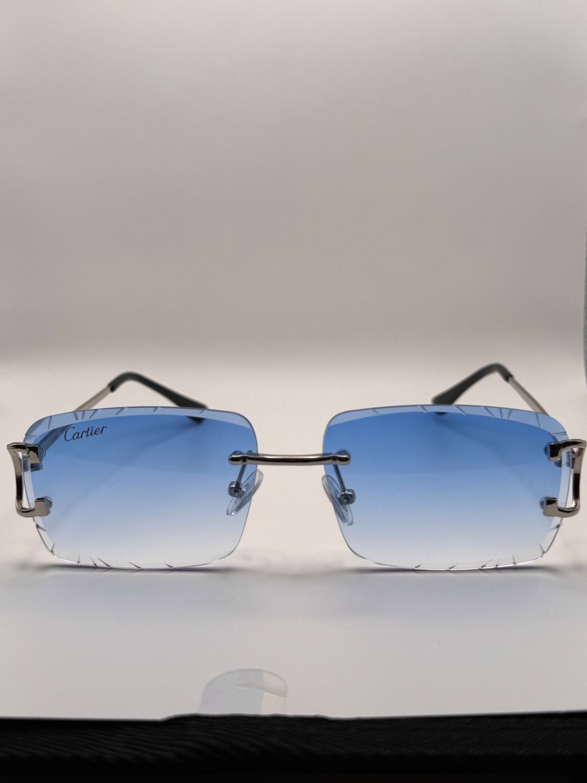 Cartier Big C Diamond Cut Frameless Blue Lens Silver Frame