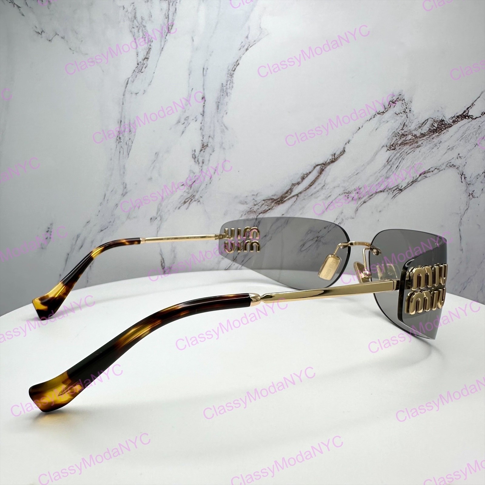New MIU MIU Sunglasses Gold Slim Runway Wrap Rimless MU A51S 5AK50K Authentic