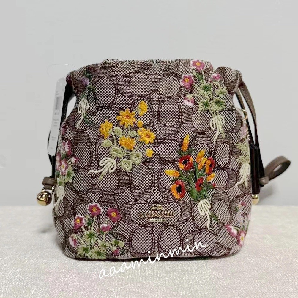 NWT Coach Faye Mini Drawstring Bag In Signature Jacquard With Floral Embroidery