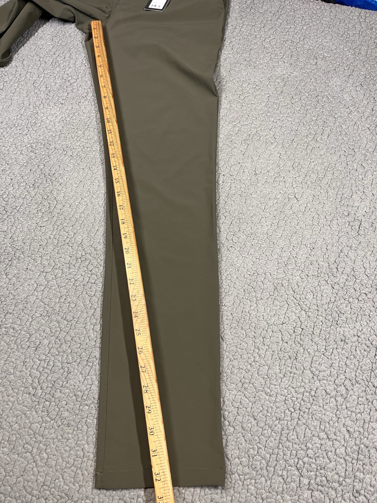 Rhone Resort Pants Sz 28 Mens Stretch Performance Travel Green UPF 50+ $138 MSRP
