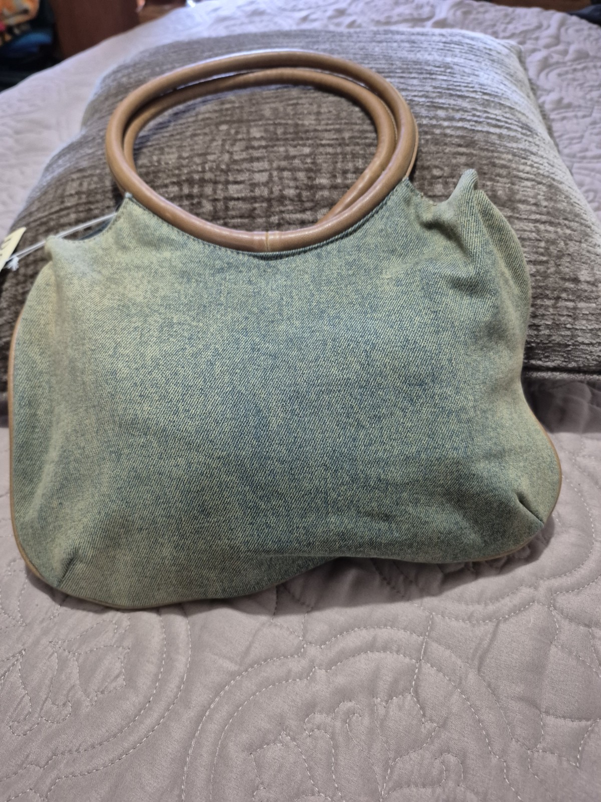 Dolce Vita light blue denim handbag with brown leather accents and floral embroi