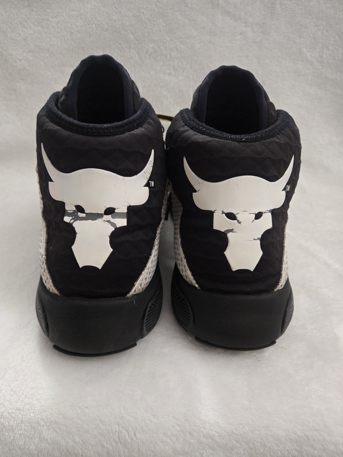 Under Armour Project Rock Delta training shoes in men’s size US 9.5 (EU 43).
